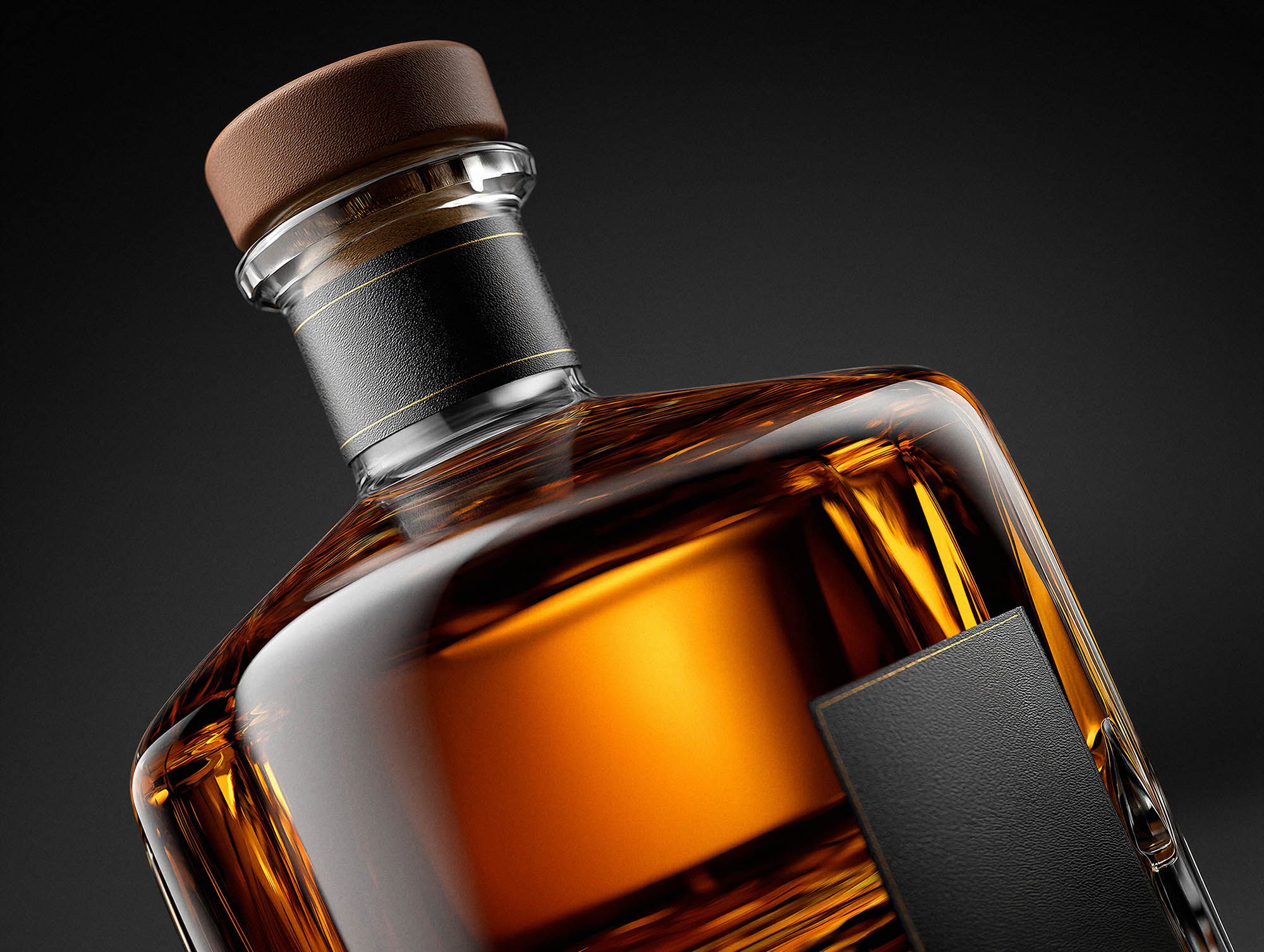 A faceted decanter of amber whisky glowing under dramatic backlighting against a dark background, with a cork stopper and black label.