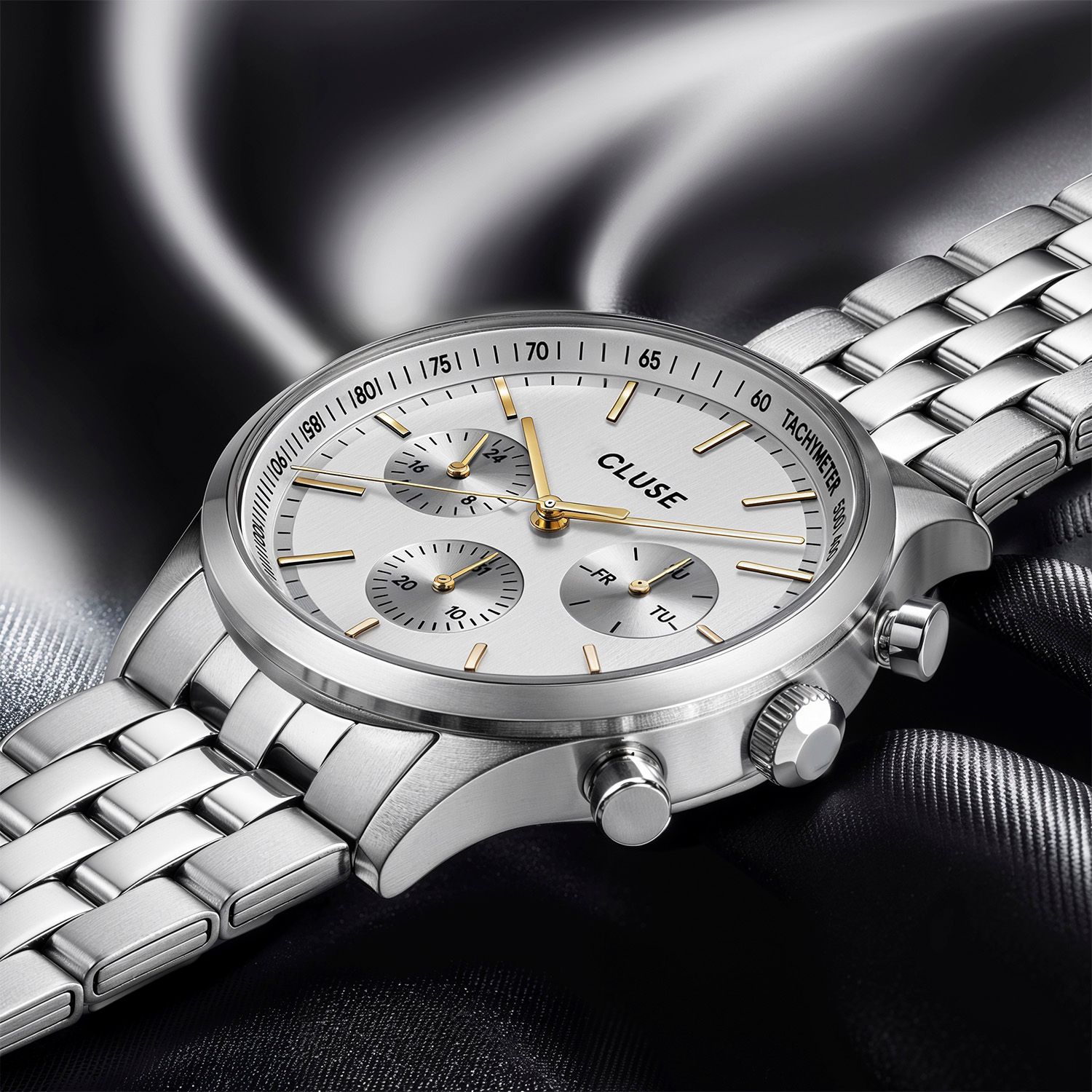 CLUSE chronograph macro square post showing sunray dial texture — Chronos Studio.